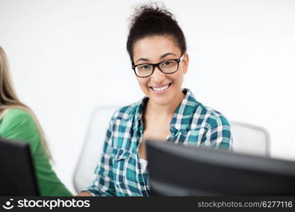 education, technology and internet - african student with computer studying at school