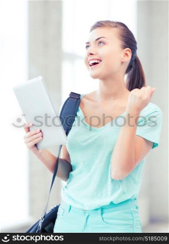 education, technology and internet concept - happy student girl with tablet pc. happy student girl with tablet pc
