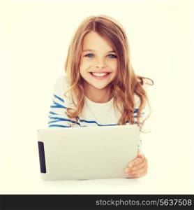 education, technology and internet concept - smiling little student girl with tablet pc computer