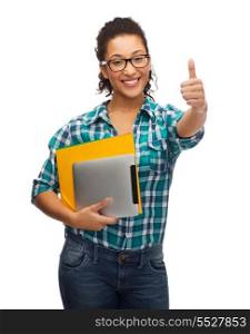education, technology and people concept - smiling female african american student in eyeglasses with folders and tablet pc