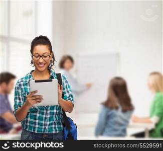 education, technology and people concept - smiling female african american student in eyeglasses with tablet pc and bag