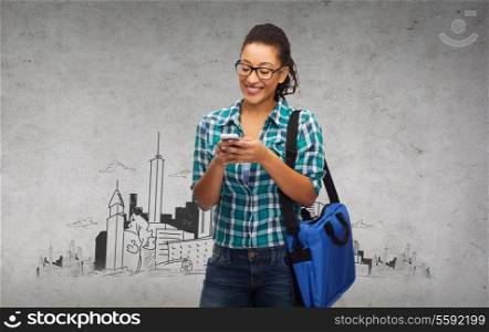 education, technology and people concept - smiling female african american student in eyeglasses with smartphone and bag