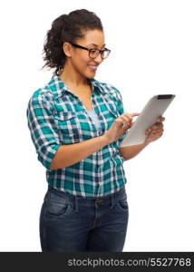 education, technology and people concept - smiling female african american student in eyeglasses with tablet pc