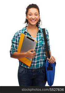 education, technology and people concept - smiling female african american student with folders, bag and tablet pc