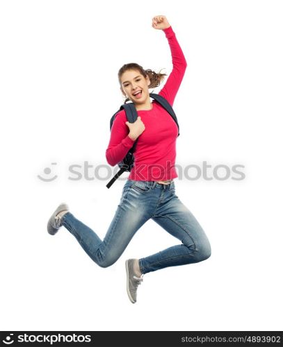education, travel, tourism, motion and people concept - smiling young woman or student with backpack jumping in air over white background