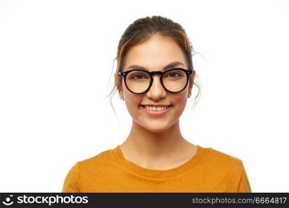 education, vision and people concept - smiling student girl in glasses over white background. smiling student girl in glasses over white
