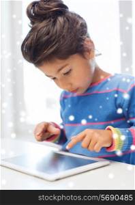 education, winter, technology and people concept - little girl with tablet pc at home