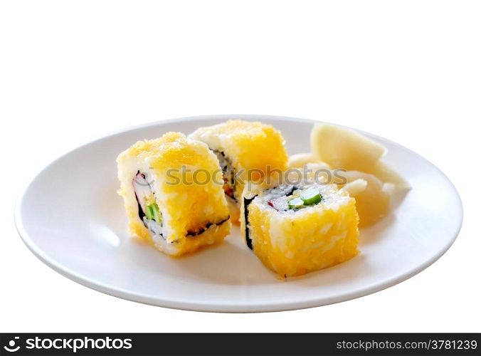 egg imitation crabmeat cucumber tuna and salmon roll sushi on white dish
