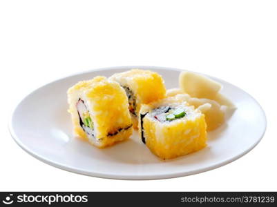 egg imitation crabmeat cucumber tuna and salmon roll sushi on white dish