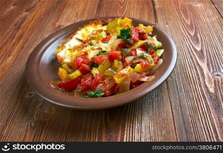 Egg in a hole is breakfast menu with tomato and capsicum
