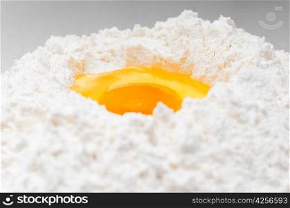 egg in flour, close up view