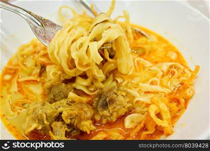 Egg Noodle in Chicken Curry or Kao Soi Kai is Thai food, northern style