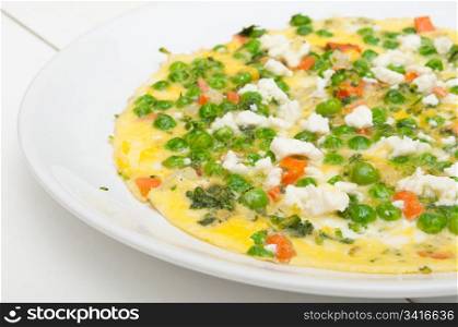 Egg Omelette With Tomatoes, Peas and Feta Cheese
