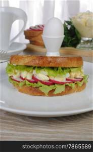 egg sandwich with lettuce radish under