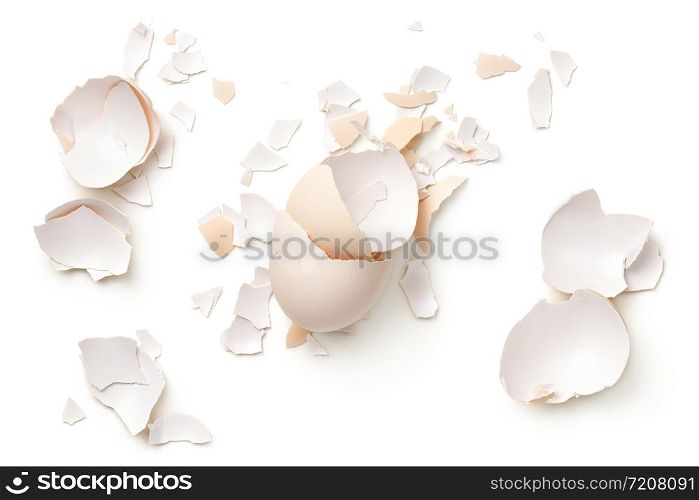 Egg shells isolated on white background. Top view, flat lay