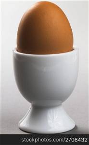 egg with eggcup. egg with egg cup on white background