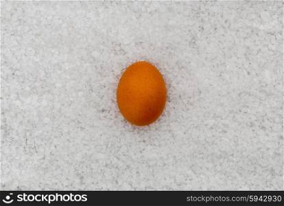 Egg with salt as a background. Egg with salt as a background.