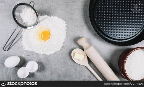 egg york flour kitchen counter with baking utensil