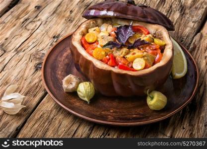 eggplant baked with vegetables. autumn baked eggplant stuffed with vegetables and spices