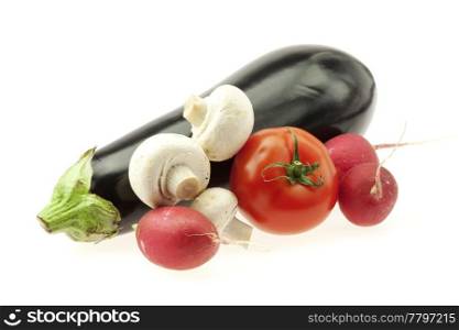 eggplant radishes tomatoes and mushrooms isolated on white