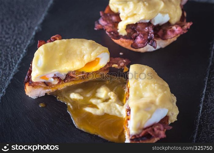 Eggs Benedict on slate tray