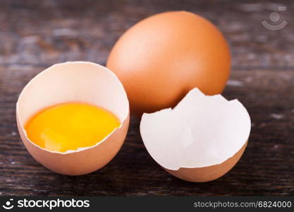 eggs. Broken eggs on a wooden background