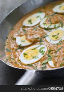 Eggs Cooked Moghali Style in a pan