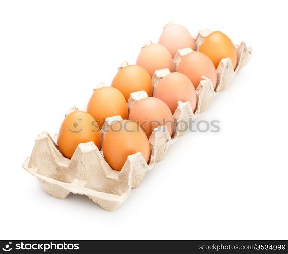 eggs in carton tray isolated on white