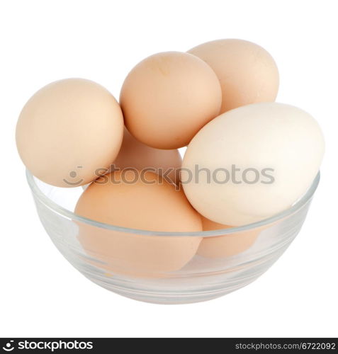 Eggs in glass bowl isolated on the white background.