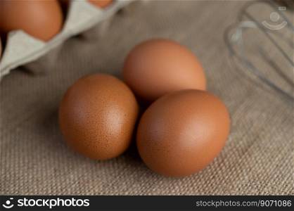 Eggs on the floor of hemp sacks. Selective focus.