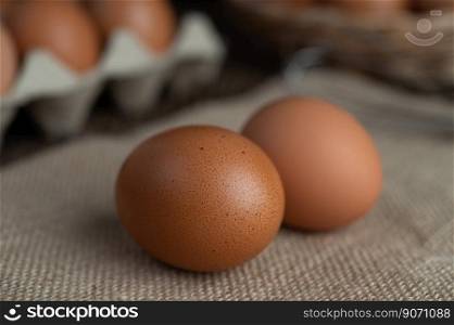 Eggs on the floor of hemp sacks. Selective focus.