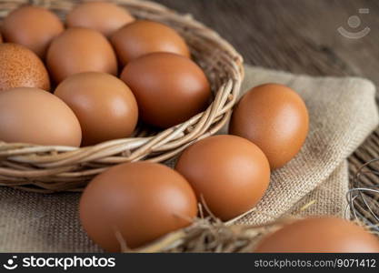 Eggs on the sacks, hemp on the wooden and straw. Selective focus