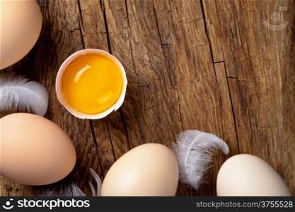 Eggs on wood background. Copy space. Top view