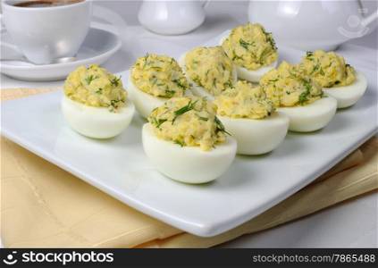 Eggs stuffed with roasted onions and herbs