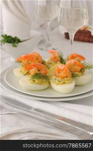 eggs stuffed with spicy stuffing with grilled shrimp