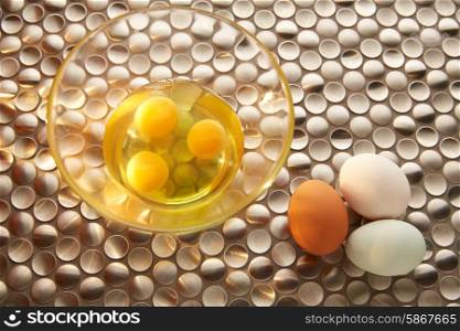 Eggs with blue easter white and brown egg colors on modern stainless steel