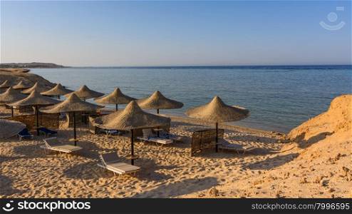 Egyptian parasols on the beach of Red Sea