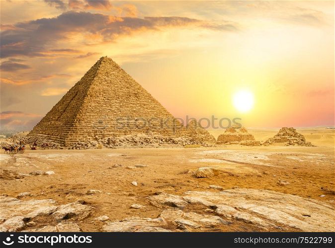 Egyptian pyramid in sand desert and clear sky. Egyptian pyramids in desert