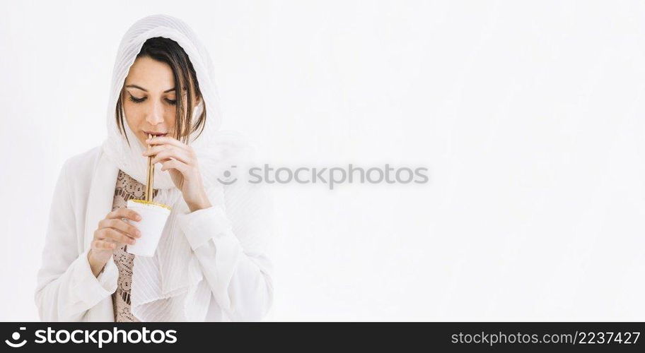 eid al fitr concept with woman drinking