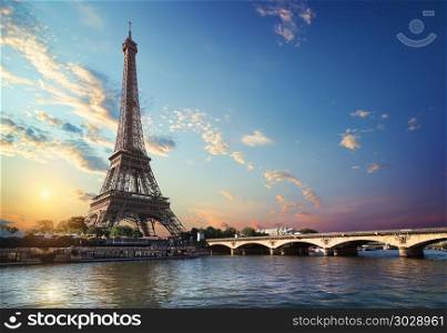 Eiffel Tower and bridge Iena on the river Seine in Paris, France.. Bridge Iena in Paris. Bridge Iena in Paris