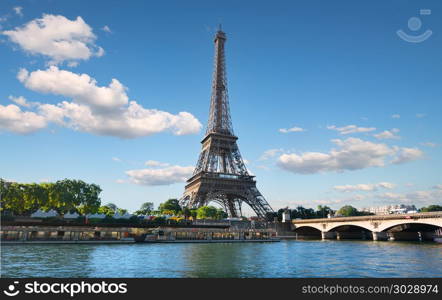 Eiffel Tower and bridge Iena on the river Seine in Paris, France.. River and bridge in Paris. River and bridge in Paris