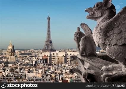 Eiffel Tower and Chimeras looking on Paris, France