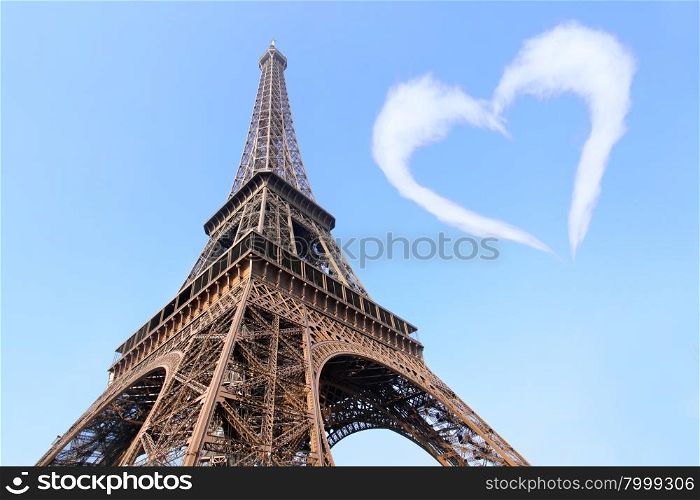 Eiffel tower and cloud-heart in blue sky