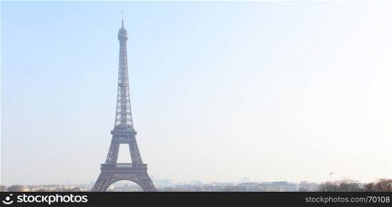 Eiffel tower and Paris skyline with big space for your own text