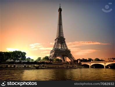 Eiffel tower and river Seine at summer evening in Paris, France