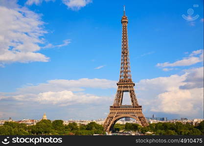 Eiffel Tower in Paris under blue sunny sky at France