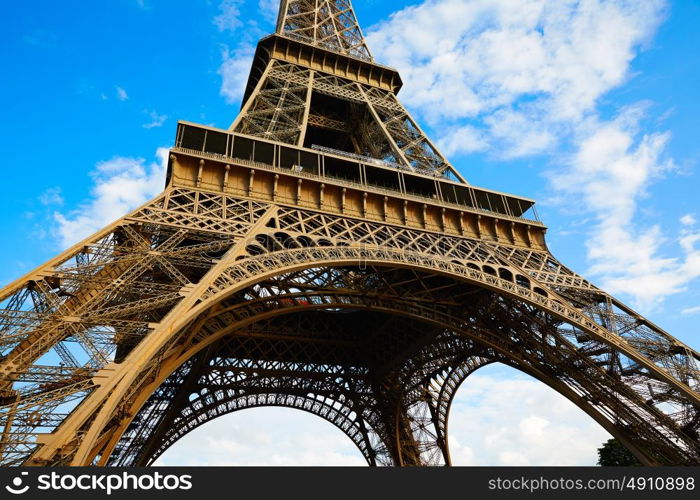 Eiffel Tower in Paris under blue sunny sky at France