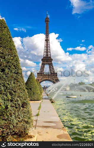 Eiffel Tower most visited monument in France and the most famous symbol of Paris in a summer day