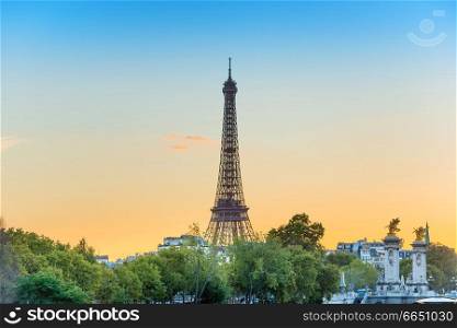 Eiffel Tower on Park Ch&de Mars at sunset in Paris, France