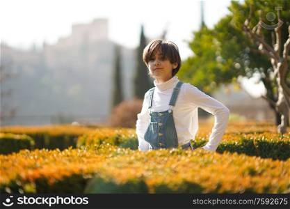 Eight-year-old girl having fun in an urban park in Granada. Eight-year-old girl having fun in an urban park